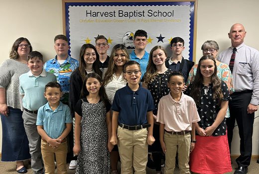 A group photo of the students and staff of Harvest Baptist School