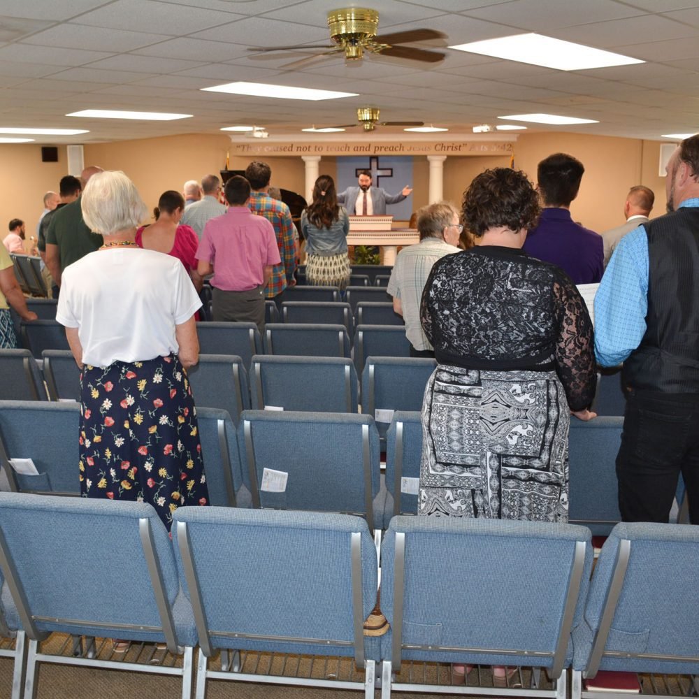 The auditorium of Harvest Baptist Church in Manhattan, KS during a Sunday service